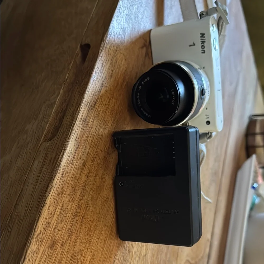 Nikon White Digital Camera with Mirrorless Design and Standard Zoom Lens
